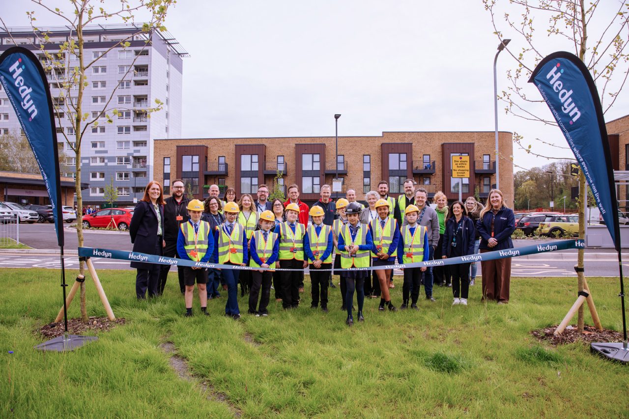 Hedyn colleagues and pupils from Milton Primary cut the ribbon at the big Ringland shopping centre opening.